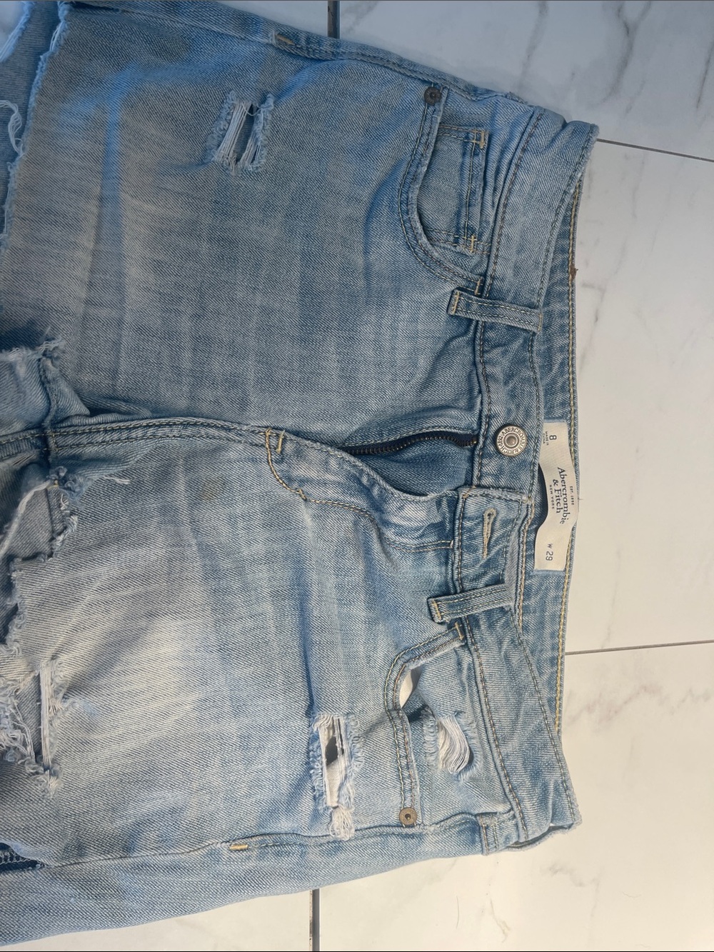 Light Blue Distressed Women’s Cutoff Jeans Shorts